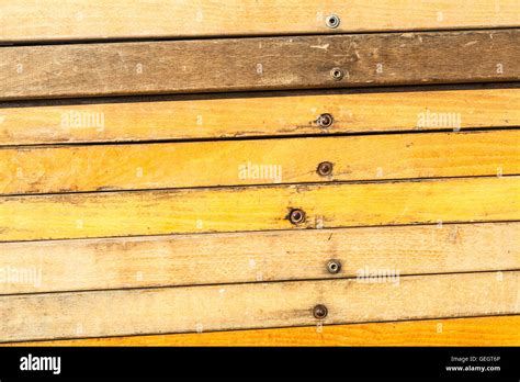 Pile of wooden folding chairs as background Stock Photo - Alamy