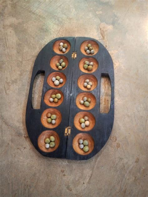 Handmade mancala board - ramplora