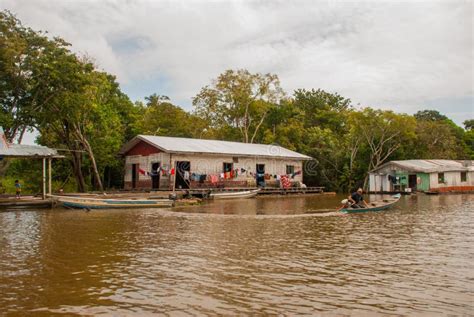 Amazon River, Amazonas, Brazil: Wooden Local Huts, Houses on the Amazon River in Brazil Stock ...