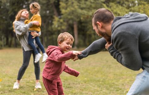 Free Photo | Parents and kids playing together outside