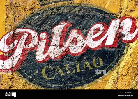 Pilsen beer sign painted on wall. Urubamba, Peru Stock Photo - Alamy