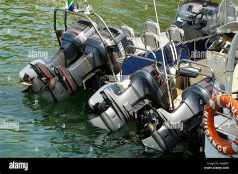 Powerboat engines outboard Stock Photo - Alamy