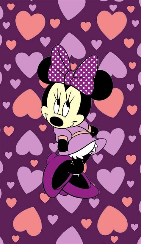 minnie mouse with hearts in the background