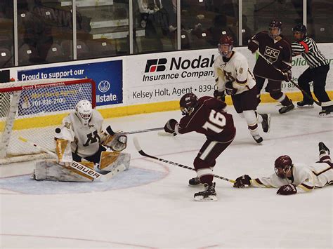 MHS hockey struggles against defending champs Grand Forks Central ...