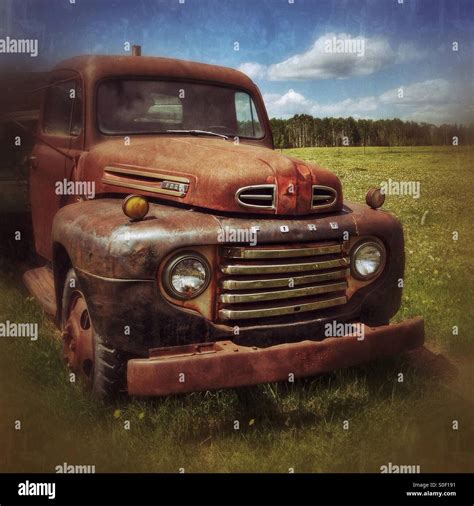 Rusty old Ford truck, in a field. Alberta countryside, Canada Stock ...