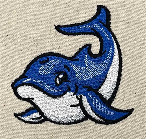 Embroidery Design: Smiling Dolphin – 3 sizes