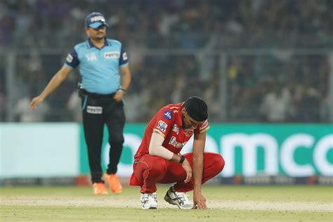 Arshdeep Singh on his haunches after conceding a four off the final ball | ESPNcricinfo.com