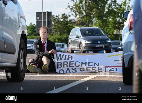 Dresden, Germany. 14th July, 2023. A member of the Last Generation ...