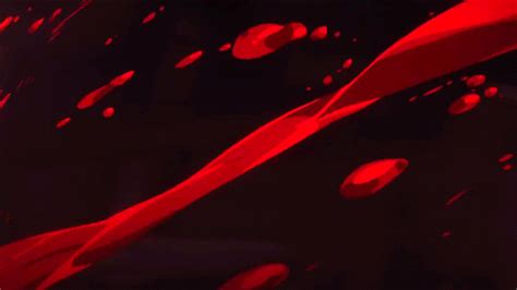 red liquid flowing down the side of a black wall