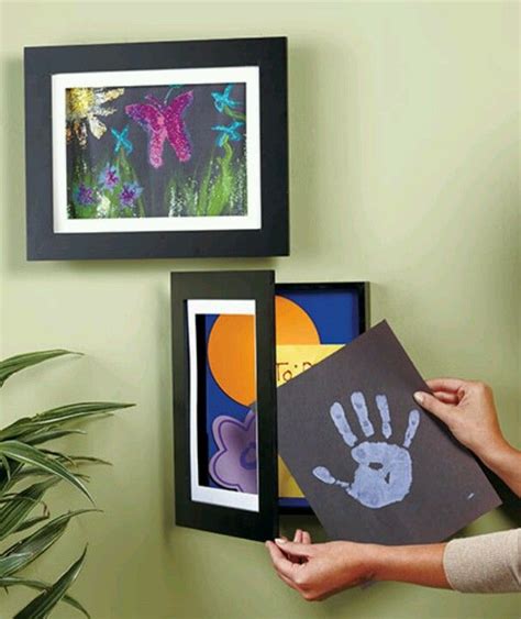 Easy art change frame - holds up to 50 behind the front one. Less than ...