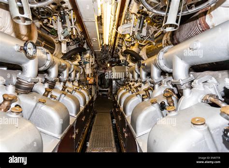 The main engine room in the British Oberon class submarine, HMS Ocelot showing aisle between the ...