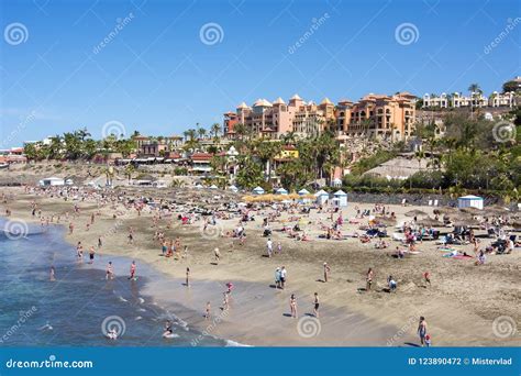 Tourists on El Duque Beach in Costa Adeje, Tenerife, Spain Editorial Photography - Image of ...