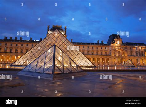 The Louvre Museum at night, Paris, France Stock Photo - Alamy