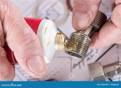 Plumber Putting Sealing Paste on a Thread Stock Image - Image of sanitary, hand: 61335189