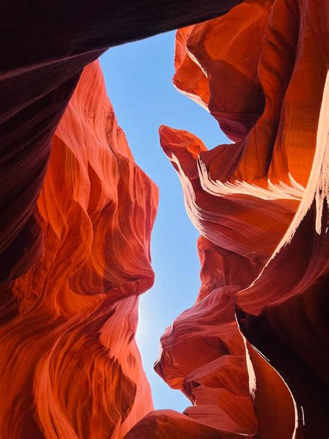 Orange Rock Formation against Blue Sky · Free Stock Photo