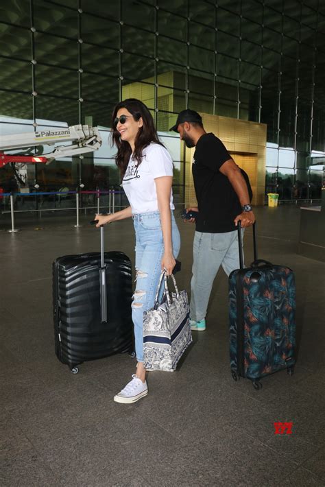 Karishma Tanna With Husband Spotted At Airport Departure - Gallery - Social News XYZ