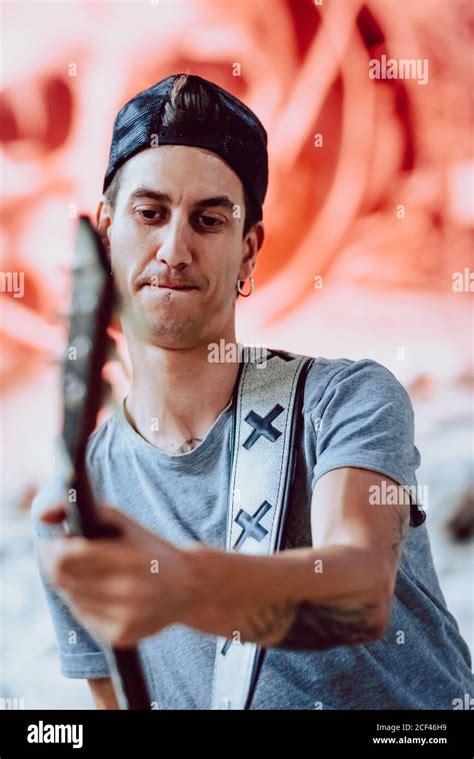 Musician playing electric guitar Stock Photo - Alamy