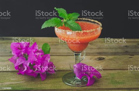 Strawberry Margarita Cocktail With Mint Leaves On Rustic Wooden Background Stock Photo ...
