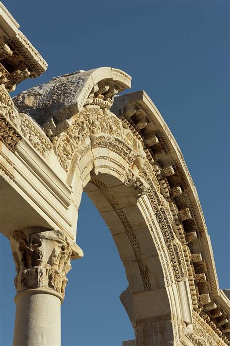 Facade Of The Temple Of Hadrian Photograph by David Parker