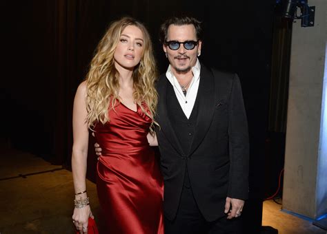 Amber Heard and Johnny Depp Have Reached a Settlement in Their Divorce ...