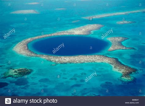 Belize s Blue Hole on Lighthouse Reef a collapsed cave system formed when sea levels were lower ...