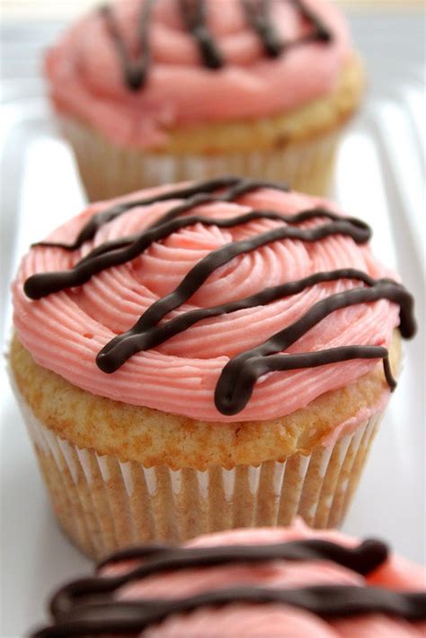 Baked Perfection: Strawberry filled Vanilla Cupcakes with Strawberry Buttercream