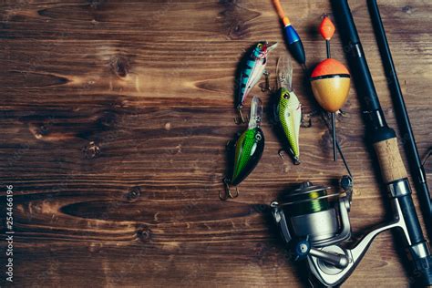 Art sports fishing rod and tackle background Stock Photo | Adobe Stock