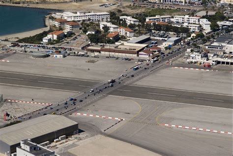 Strange Airport: Gibraltar, World’s Only Airport Runway Intersecting a Road - photofun 4 u com