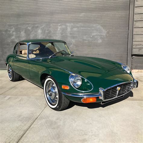 The Classic Look of a 1972 Jaguar XKE V12 2+2 in British Racing Green : r/Autos