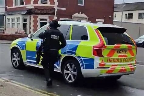 Armed police called to Cardiff street after reports of person being 'chased by men with weapons ...