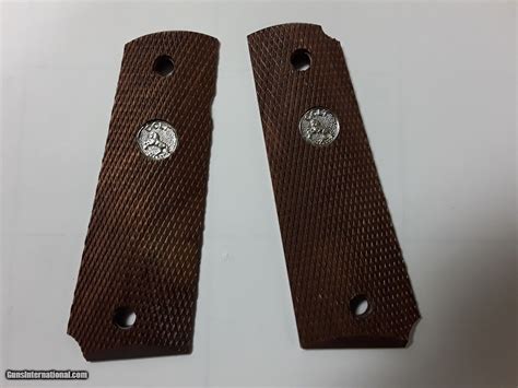 COLT 1911 ORIGINAL WOOD GRIPS W/SILVER INSIGNIA NOS