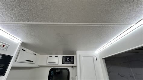 How to Update Old RV Ceiling Panels - Getaway Couple