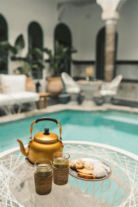 Gold Teapot on White Round Table · Free Stock Photo