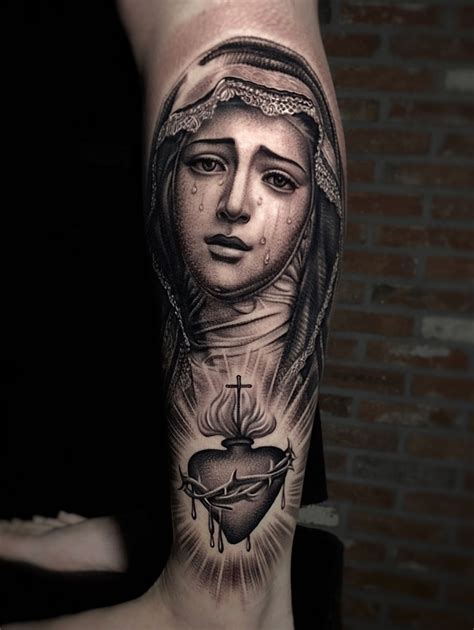 Tattoo uploaded by Kiljun | Virgin Mary in tears on the leg. | 976748 ...