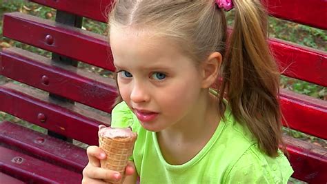 Child Eating Ice Cream Outdoor. Stock Footage Video 2587352 | Shutterstock