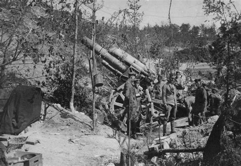 Figure 1.-- This postcard-back photograph shows a German World War I Heavy 210 mm mortar with ...