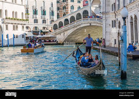 Gondola Leaving Rialto Bridge Stock Photo - Alamy