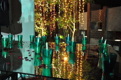 Green candles with a decorative lighting on the backdrop at the "Light A Candle Of Support ...