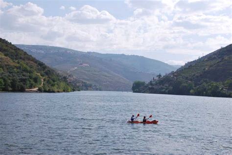 Pinhão: Douro Valley Rabelo Boat Tour and Kayak Experience | GetYourGuide