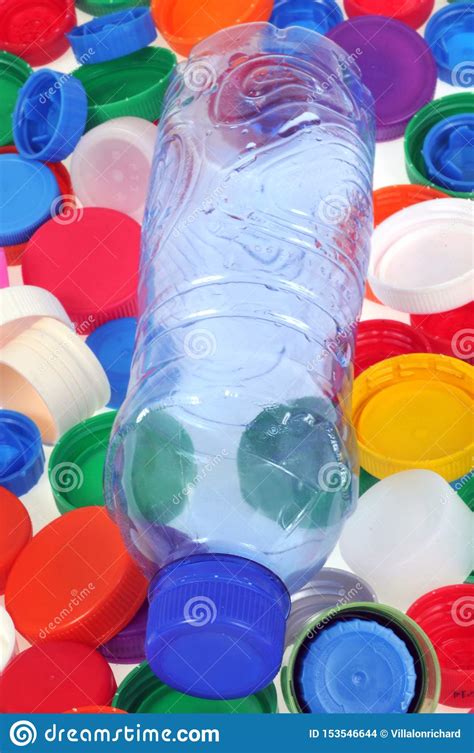 Bottle and Plastic Caps of Different Colors Stock Photo - Image of concept, bottle: 153546644