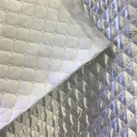 White Quilted Polyester Batting Fabric | iFabric