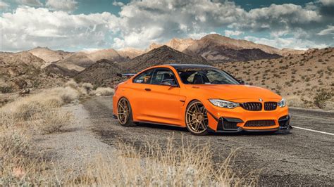 Download 4k Bmw M4 Gts Orange Wallpaper | Wallpapers.com