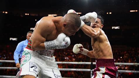 Isaac 'Pitbull' Cruz defeats Rolando 'Rolly' Romero to earn WBA Junior Welterweight title with ...