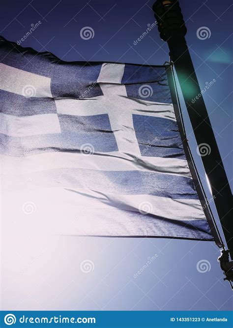 Greek flag waving o wind stock image. Image of flag - 143351223