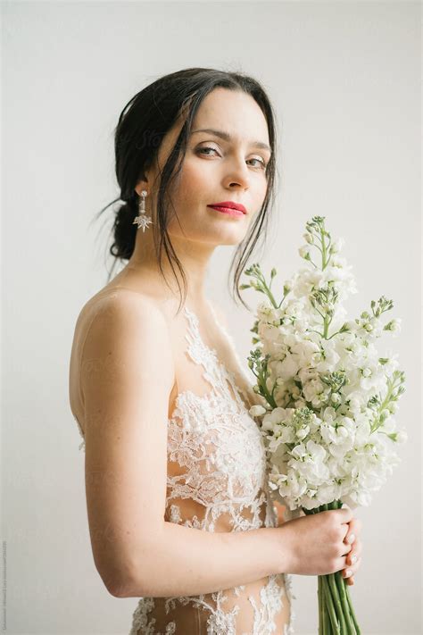 "Wonderful Bride In Veil With Floral Bouquet" by Stocksy Contributor ...