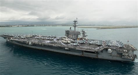 Captain of aircraft carrier with growing coronavirus outbreak pleads for help from Navy