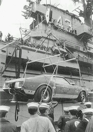 Old Photo of 1970 'Lawman' Super Boss 429 being unloaded in Vietnam - Mustang Specs