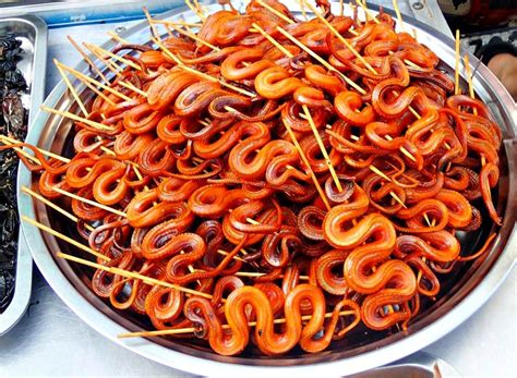 bizarre Cambodian food, grilled snake, ពស់អាំង | Bizarre foods, Food, Khmer food