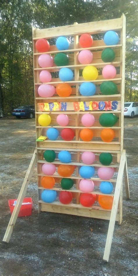 DIY Dartless Balloon Pop Game ~ Double-sized pallet & extra pallet boards. We turned the boards ...