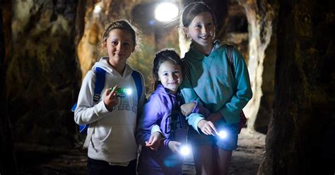 Don't forget your torch to explore the Grotto Caves at Hawkstone Park Follies